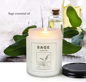 Scented candle in frosted glass jar with natural soy wax blend and sage botanical label.