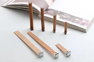 Wooden candle wick details, cross and flat wood slices with metal bases for DIY candles.