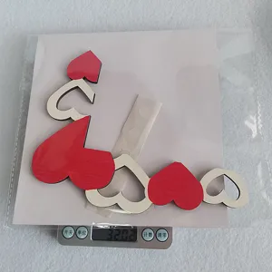 Wooden heart corner decor detail view showing lightweight wooden crafting material and design.