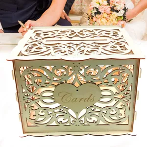 Wooden wedding card box with hollow carved heart design, wedding reception accessory detail.