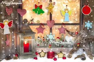 Detailed view of wooden Christmas decorations, painted festive hanging ornaments and lantern.