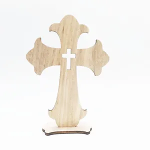 Wooden cross craft ornament detail view, smooth polished wood texture with hollow center design.