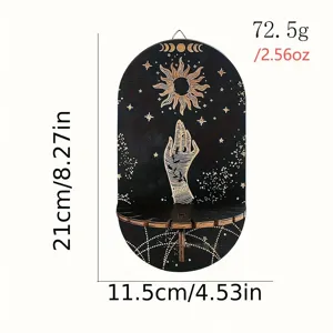 Schwarzes Holzregal Detail im Boho Design mit Mond und Sonne, Wandaufhaengung Display.