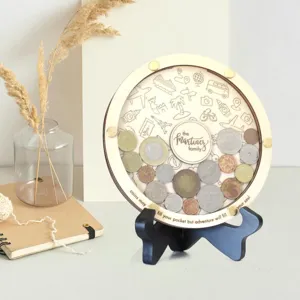 Personalized wooden coin savings box detail view, travel theme engraved gift for family.