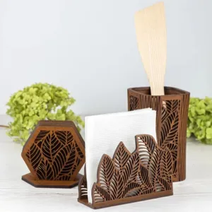 Wooden kitchen utensil holder and napkin rack set with hollow leaf pattern detail view.