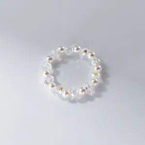 Minimalist ins-style iridescent crystal pearl beaded ring detailed view showing sparkling facets.