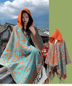 Ethnic style hooded cape cloak with tassel hem, vibrant orange and blue print for women.