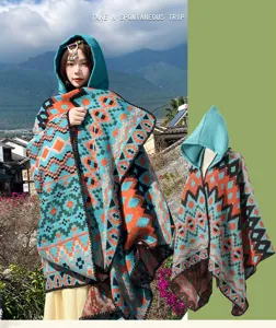 Detailed view of the ethnic style hooded poncho shawl, showcasing geometric knit texture.