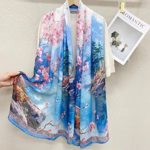 Exquisite cherry blossom landscape print silk scarf detail, elegant sun protection shawl style.