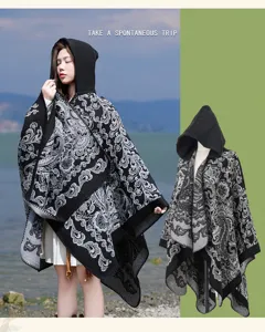 Detailed view of the black and white hooded vintage patterned cape shawl, cozy winter wear.