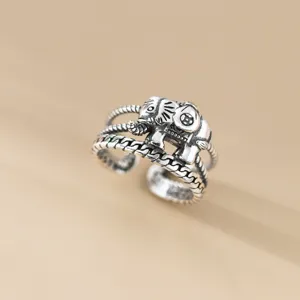 Closeup of S925 sterling silver vintage elephant open ring with multi-layer chain design.