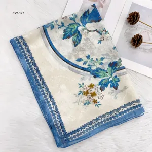 Vintage blue floral silk scarf detail, elegant lace trim, lightweight fabric summer shawl.