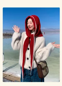 Stylish red knitted balaclava hood for women, perfect for autumn warmth and outdoor fashion.