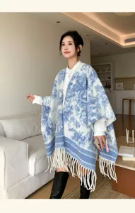 Blue white patterned knitted cape for women, stylish fringe shawl for autumn and winter.