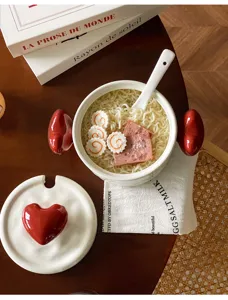 Cute ceramic instant noodle bowl with red heart handles and lid, perfect for daily home use.