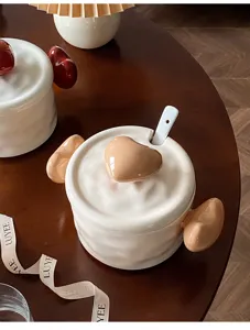 Cute ceramic soup bowl with heart lid and handle, perfect for kitchen tableware and daily use.