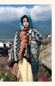 Bohemian style hooded split shawl detail, ethnic geometric pattern multi-color cashmere feel.