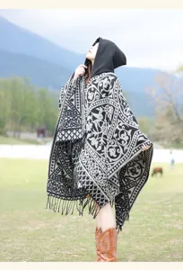 Ethnic style hooded poncho cloak, black and white geometric pattern knit cape with fringe.