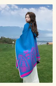 Detailed outdoor view of the ethnic style knitted shawl cape, warm and stylish wear.