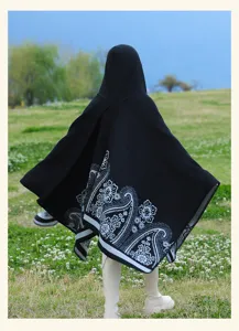 Men's ethnic style black hooded cloak cape with white paisley print for outdoor travel winter warmth.