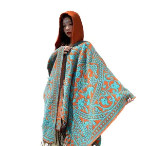 Ethnic style hooded knitted shawl cape for women, warm winter fashion autumn outerwear.