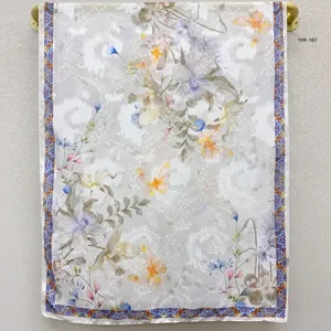 Detail of lightweight floral butterfly printed silk scarf, elegant shawl texture and pattern.