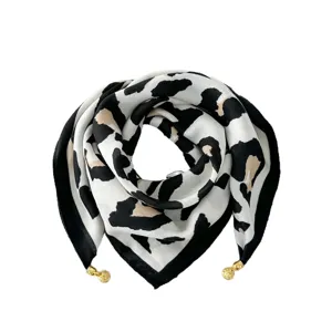 Stylish black and white leopard print scarf with magnetic buckle, elegant neck wrap.
