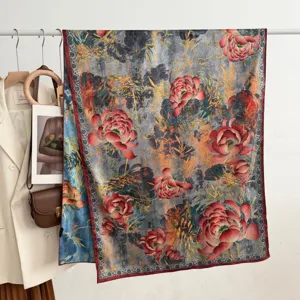 Close-up detail of the vintage Chinese style floral printed silk scarf hanging on display.