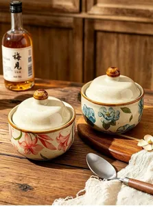 Detailed view of Japanese ceramic stew pot with lid, floral pattern, ceramic soup bowl.