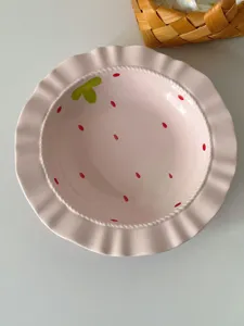 Cute pink ceramic dinner plate with strawberry pattern and ruffled edge for home kitchen use