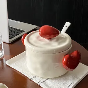 Ceramic lidded soup bowl with red heart handles, ideal for ramen, noodles, and home kitchen use.