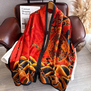 Exquisite silk scarf detail showing retro dragon scale pattern and luxurious red gold design.