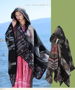 Ethnic style hooded knitted cloak poncho for women, vintage geometric pattern winter outerwear.