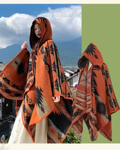 Ethnic knit hooded cloak shawl detail view, retro warm winter outerwear fashion piece.