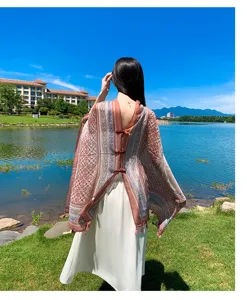 Detailed view of new Chinese style ethnic print cape shawl, lightweight summer sun protection scarf.