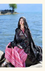 Ethnic style knitted hooded cape shawl detail view, showing vintage geometric pattern design.