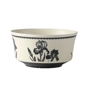 Bol de sopa de ceramica retro con patron floral negro, elegante decoracion de mesa hogar.