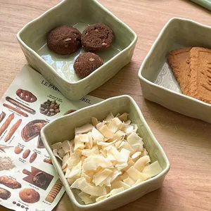 Ceramic square sauce dish in light green, perfect for dumplings, snacks, soy sauce, and table decor.
