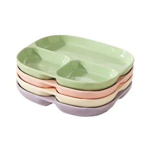 Juego de platos llanos divididos de ceramica, apilables de colores pastel para el desayuno.