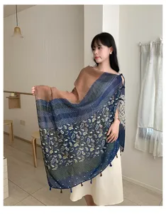 Detailed view of the elegant ethnic paisley print women summer sun protection shawl scarf.