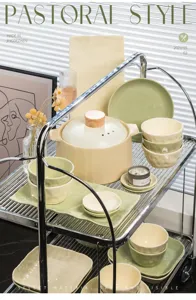 Cream style ceramic tableware set with elegant green and white bowls and plates for home kitchen.