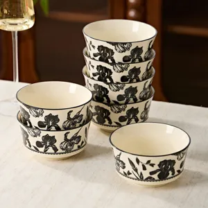 Elegant ceramic bowl set featuring a vintage black floral pattern, ideal for daily home meals.