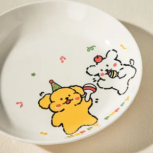 Close-up detail of cute cartoon puppy printed ceramic dinner plate with colorful glaze.
