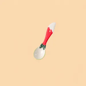 Cute ceramic soup spoon with red handle and green bow, 15.8cm length, lightweight design.