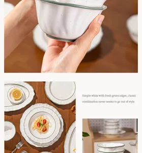 Juego de vajilla de cerámica con borde verde fresco y diseño blanco para comedor moderno.