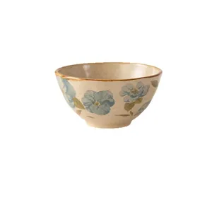 Japanese style ceramic rice bowl with underglaze blue floral pattern, perfect for home kitchen use.