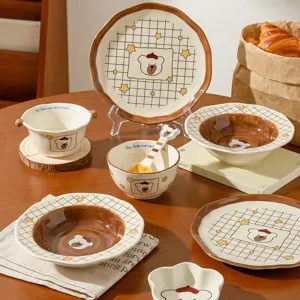 Cute cartoon ceramic tableware bowl and plate set, tabletop main view for home dining.