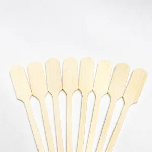 Wooden bamboo skewers mini fruit sticks paddle handle design close up detail view