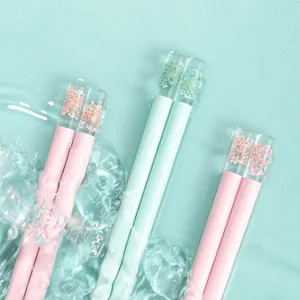Japanese style alloy chopsticks with transparent dried flower embedded ends, anti-slip design.