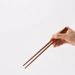Natural solid wood chopsticks, non-slip tip design for easy daily dining and kitchen use.